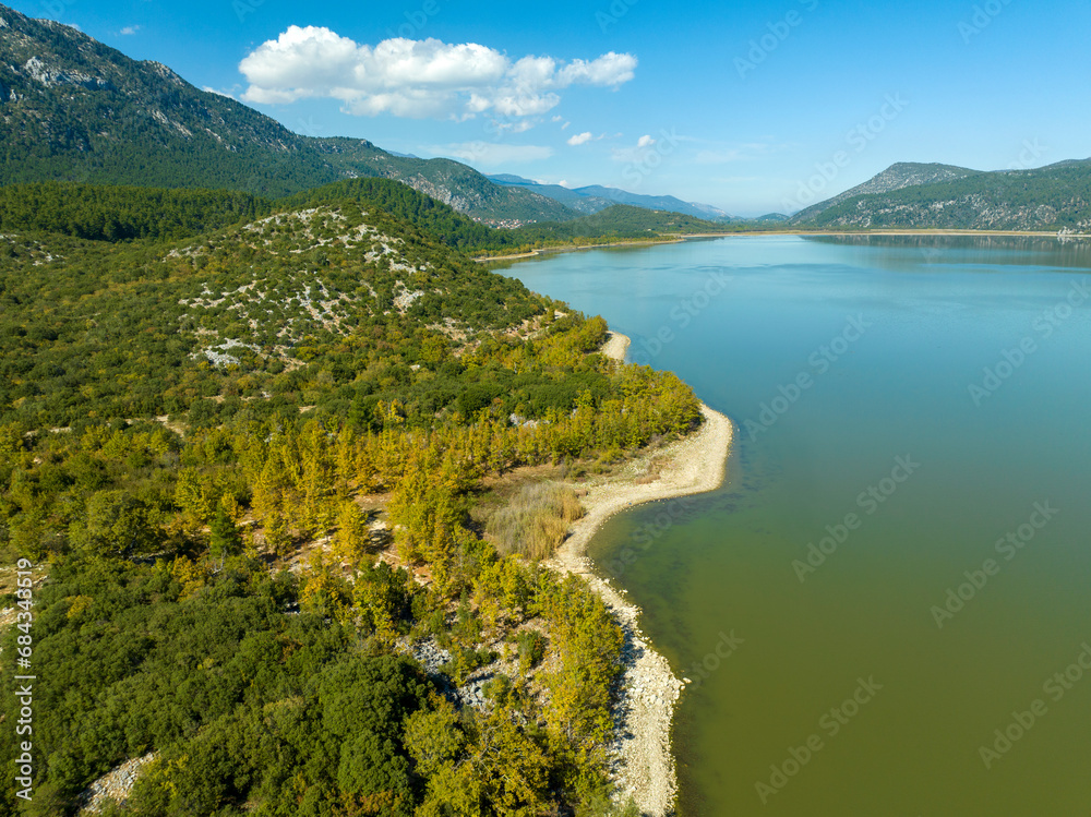 The beautiful landscapes of Kovada Lake, mountains and green area from the air. Isparta Lake District, Turkey