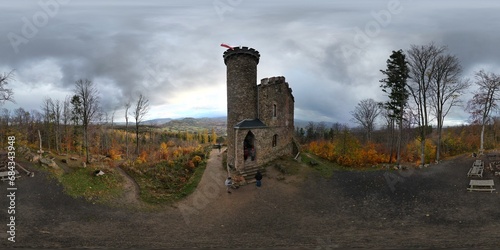 Drone 360 shot of Prince Henry's Castle in autumn near Stawy Podgórzyńskie, Lower Silesia, Poland