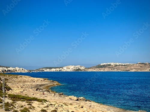 view of a seascape of the island of Malta on a sunny summer day with a rocky coast and the Mediterranean sea 