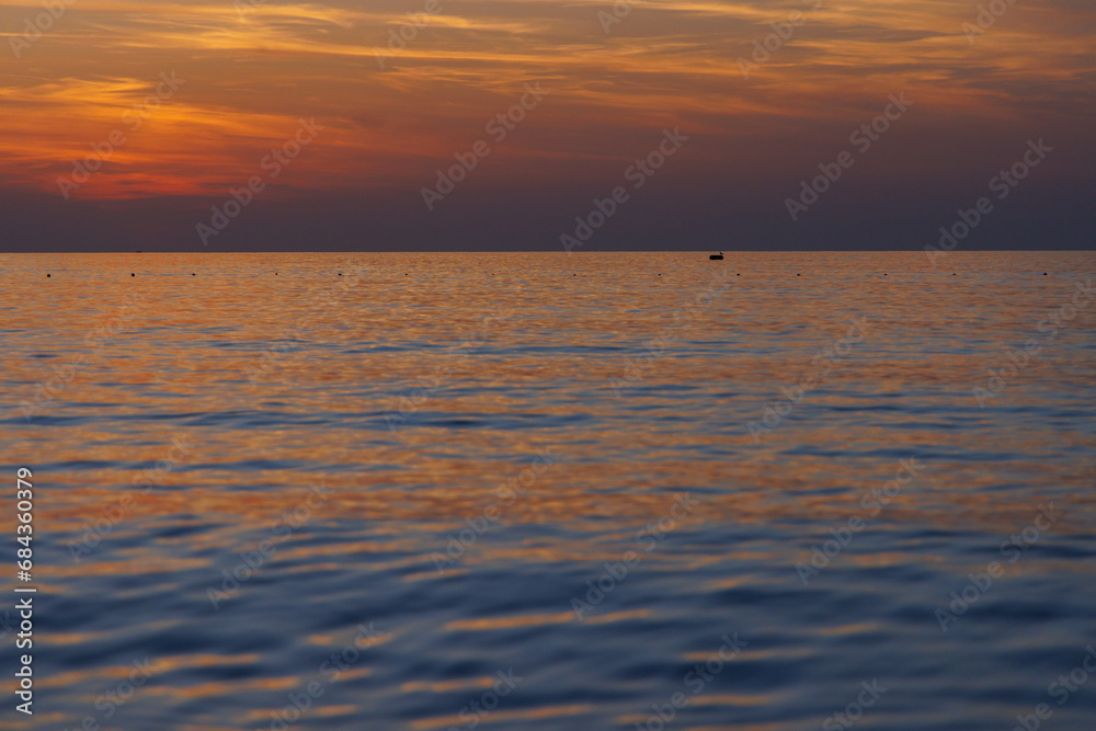 The magical color of the sea at sunset. The magical color of the sea at sunset.