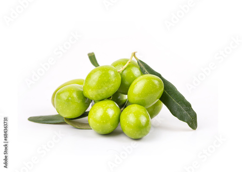 Green fresh olives on the w...