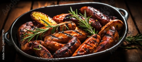 Barbecued dish with rosemary-infused grilled sausage
