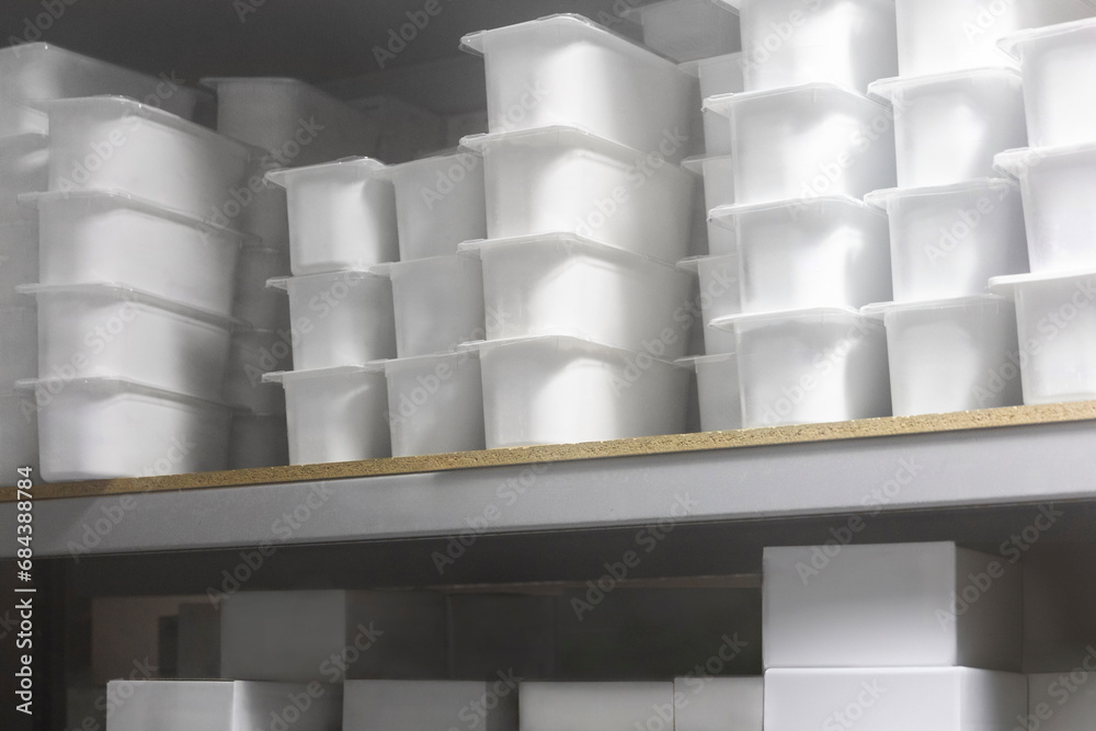 Containers of Ice Cream Stored in Cold Storage Unit Containers of Ice Cream Stored in Cold Storage Unit