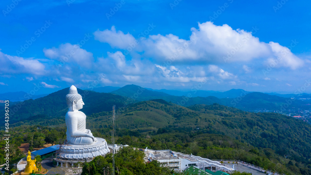 blue sky and blue ocean are on the back of Phuket Big Buddha statue.white Phuket big Buddha is the one of landmarks on Phuket island...