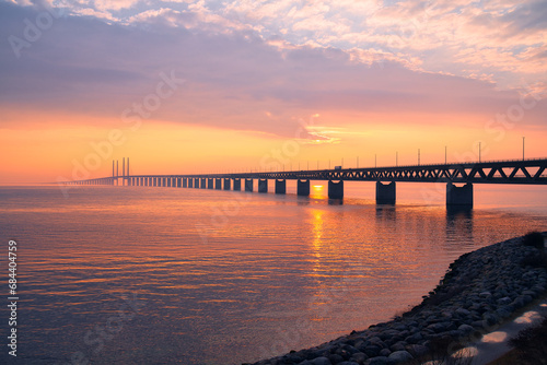 The Oresund Bridge is a combined motorway and railway bridge between Denmark and Sweden  Copenhagen and Malmo .