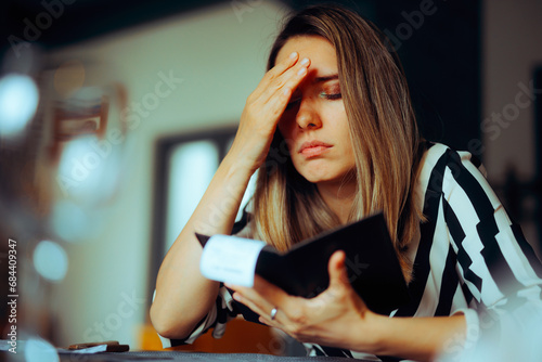 Photography Unhappy Woman Receiving an Overpriced Bill in a Restaurant