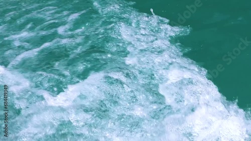 Wallpaper Mural Water waves on side of boat while moving, Boat cutting water surface. Water splashing on blue river. Boat creating vawes on the river.
 Torontodigital.ca