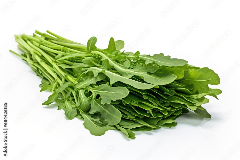 Fresh arugula leaves isolated on white background Fresh arugula leaves isolated on white background
