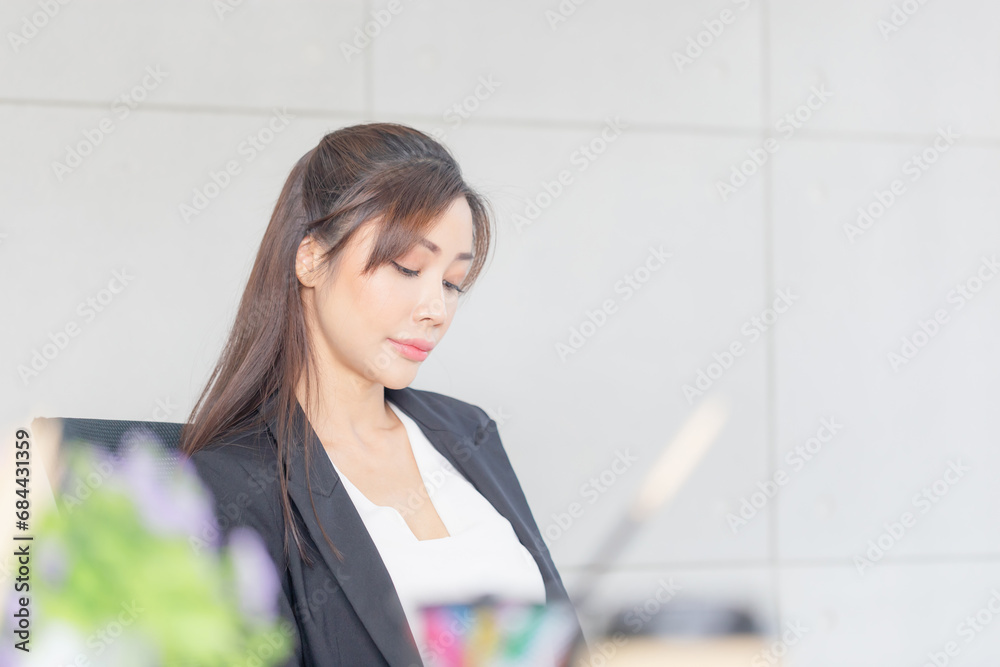 Portrait of Young business woman manager working at the office, Smiling Asian woman working in a meeting room Portrait of Young business woman manager working at the office, Smiling Asian woman working in a meeting room