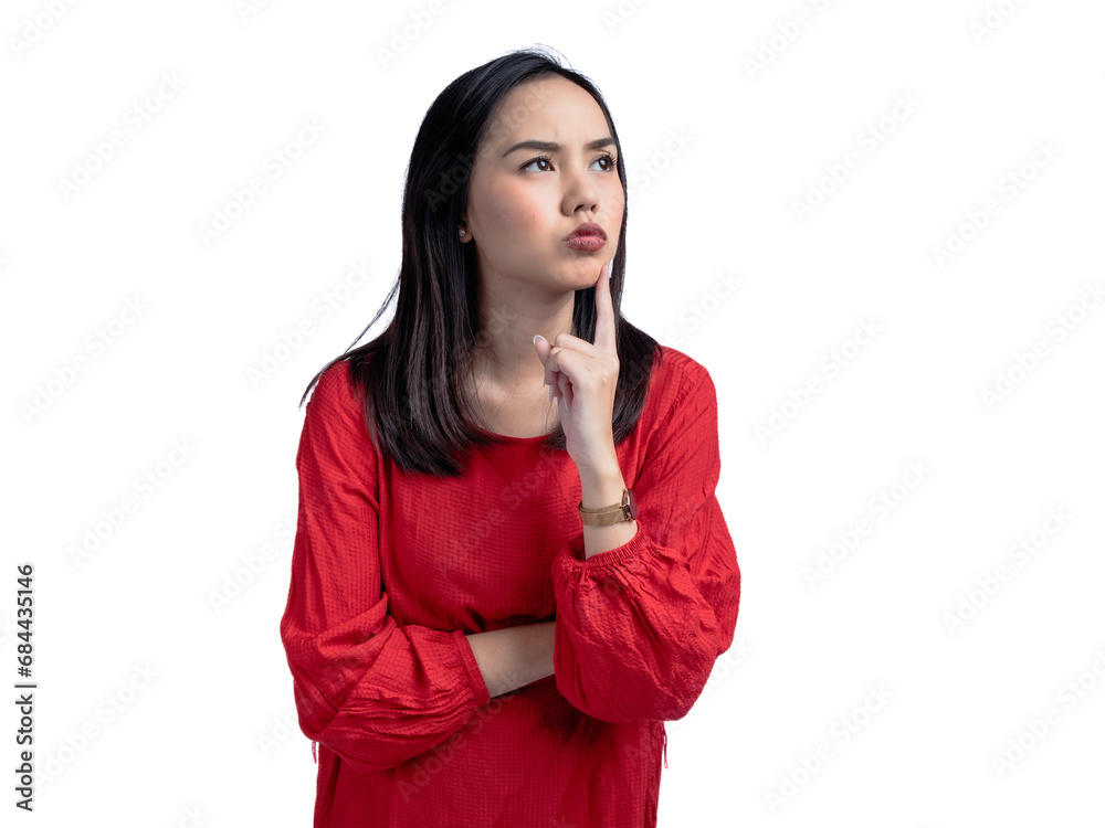 A portrait of an Asian woman wearing a red shirt, posing anxiously with her index finger touching her cheek. Isolated against a white background. A portrait of an Asian woman wearing a red shirt, posing anxiously with her index finger touching her cheek. Isolated against a white background.