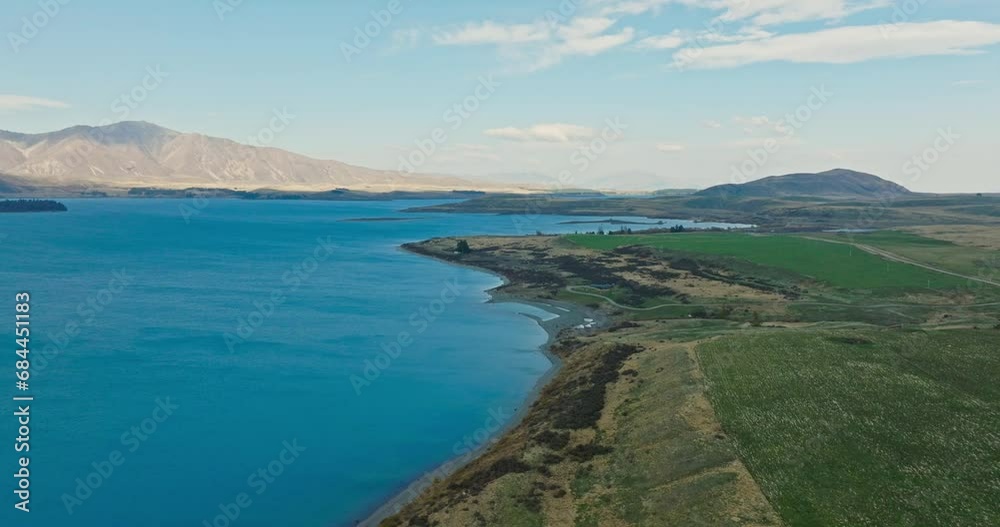 Stunning aerial view of Lake Tekapo with pristine turquoise water in Mackenzie Basin of Canterbury, New Zealand Aotearoa Stunning aerial view of Lake Tekapo with pristine turquoise water in Mackenzie Basin of Canterbury, New Zealand Aotearoa