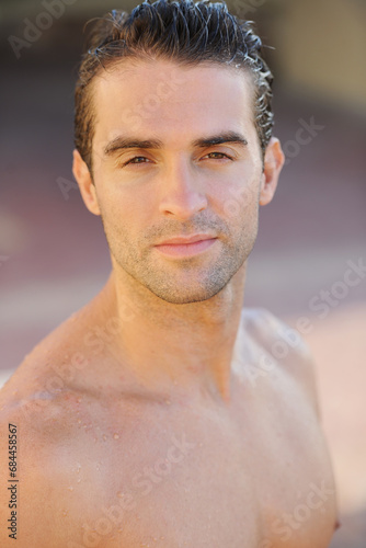 Body, portrait or man for water swimming, surfing or sports in Brazilian nature or beach for relax summer break. Serious face, athlete or wet person shirtless for training, exercise or surfer fitness