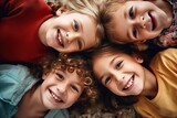 Friendship concept. Group potrait of a cheerful joyful cute little children playing together looking down camera and smiling with AI