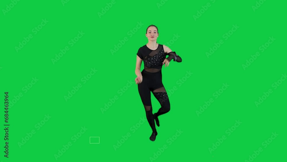Stunning female dancer performing a dance in slow motion wearing a black outfit green screen chroma key Stunning female dancer performing a dance in slow motion wearing a black outfit green screen chroma key