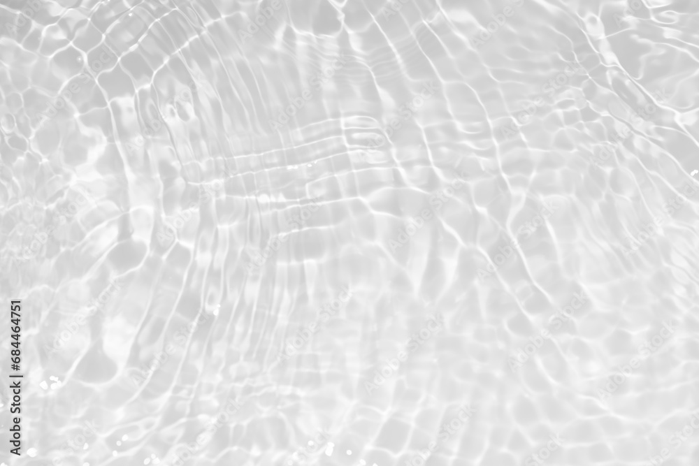 White water with ripples on the surface. Defocus blurred transparent white colored clear calm water surface texture with splashes and bubbles. Water waves with shining pattern texture background. White water with ripples on the surface. Defocus blurred transparent white colored clear calm water surface texture with splashes and bubbles. Water waves with shining pattern texture background.
