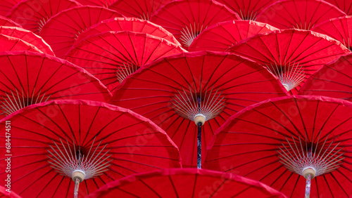 Red paper umbrella background, Backdrop red umbrella, Oiled paper umbrella, Red paper chinese umbrellas background. photo