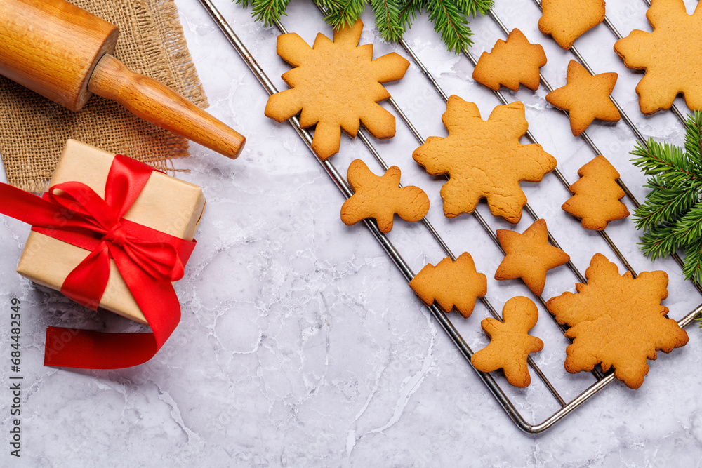 Gingerbread cookies and fir tree branch Gingerbread cookies and fir tree branch