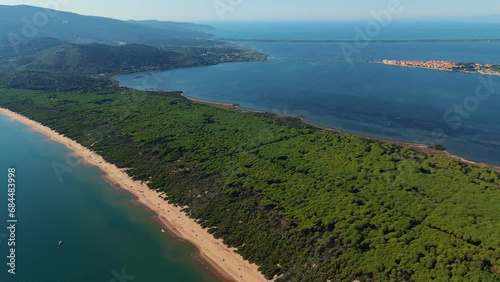 Sandy beach at Orbetello lagoon. Aerial in Tuscany with boats and yachts. Feniglia, Italy, scenic seaside aerial. photo