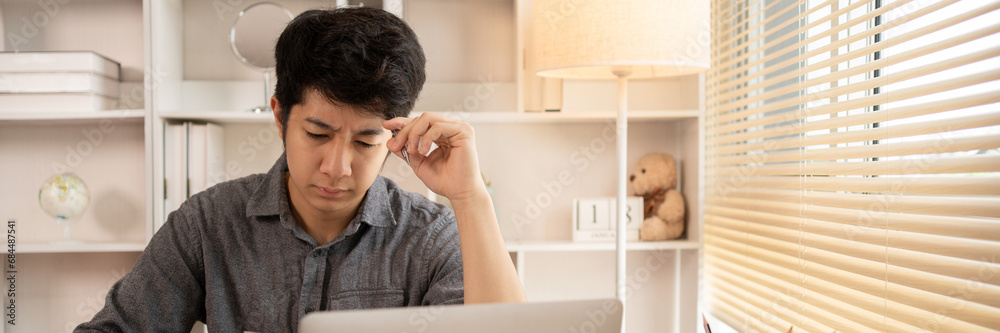 Stressed man, Man is stressed about a failed job, Stress and Money Problems, Anxiety and Worry Concept. Stressed man, Man is stressed about a failed job, Stress and Money Problems, Anxiety and Worry Concept.