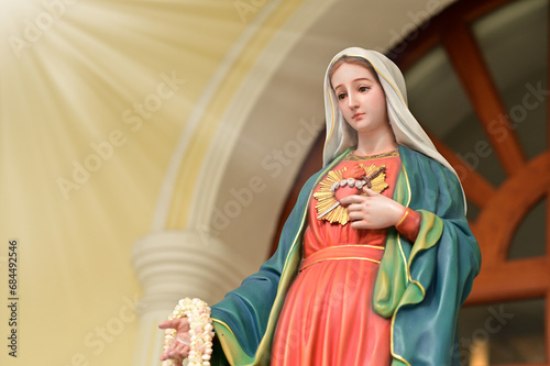 Close up of Statue of Our lady of grace virgin Mary in the church, Thailand. selective focus.
