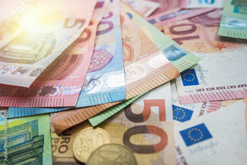 background of euro bills and coin, cash money