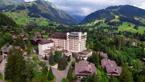 Gstaad - elegant and popular mountain ski resort in Swizerland, canton Bern. aerial drone video photo