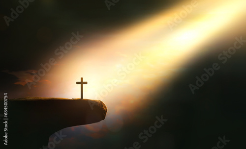 cross of jesus christ on sorrow darkness and bright light and rays background