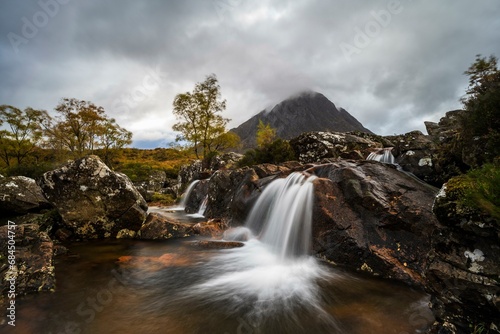 Waterfall in Autumn Landscape, Buachaille Etive Mor Mountain in Glen Etive, Glencoe Valley, West Highlands, Scotland, United Kingdom, Europe