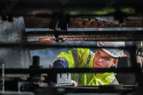 Rail technicians identify, repair engine issues, prevent fuel leaks for efficient train operation