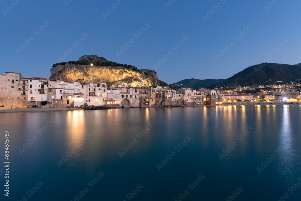 Italy, Sicily, Cefalu, Long exposure of coastal town at dusk Italy, Sicily, Cefalu, Long exposure of coastal town at dusk