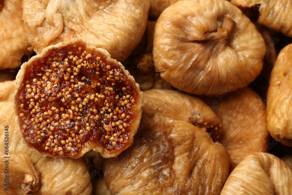 Many tasty dried figs as background, top view Many tasty dried figs as background, top view
