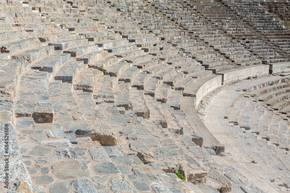 Row of marble seats for spectators. Ancient theater in Ephesus, Turkey in a beautiful summer day
