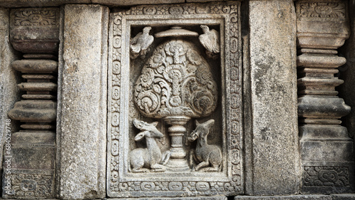 Stone relief on the wall of Prambanan Temple. A Hindu temple located in Yogyakarta, Indonesia