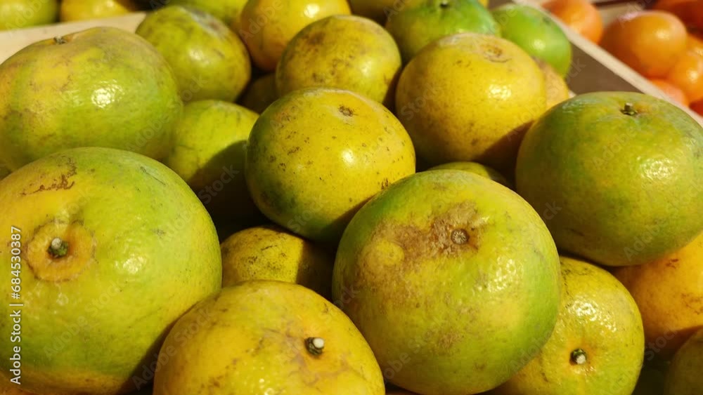 Close-up of oranges from a supermarket counter. Close-up of oranges from a supermarket counter.