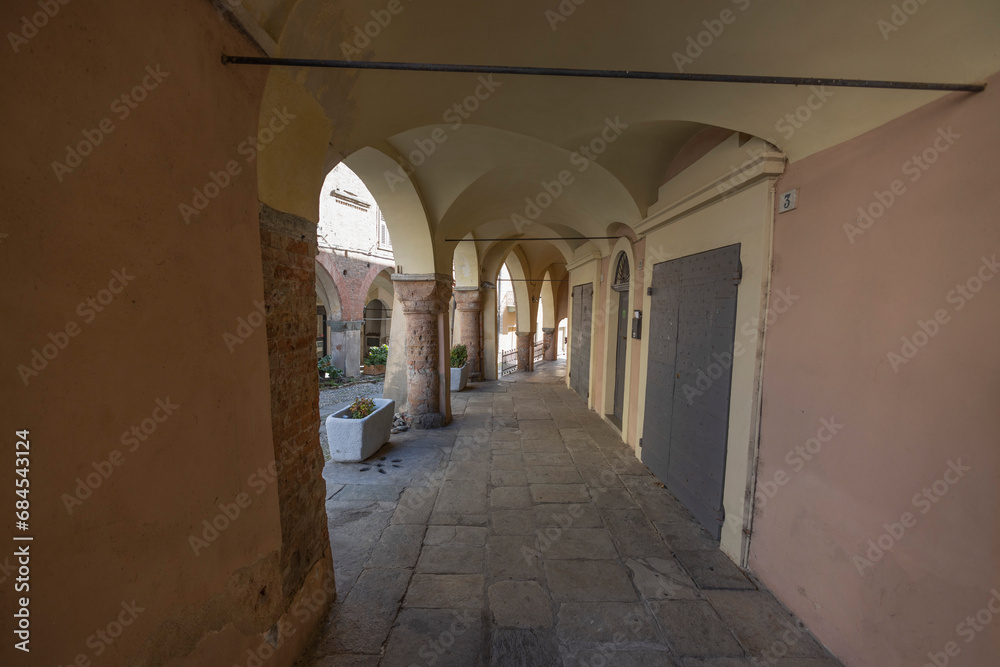 AVIGLIANA, ITALY, OCTOBER 11, 2023 - View of the porticoes in the center town of Avigliana, province of Turin, Piedmont, Italy