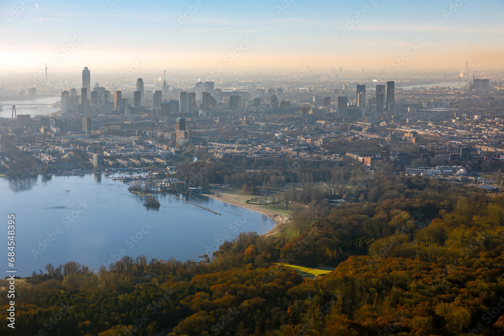 Skyline Dutch city Rotterdam in fall with autumn colors