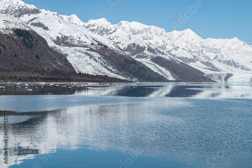 Tidewater Glacier reflected in the calm waters of College Fjord, Alaska, USA © dvlcom