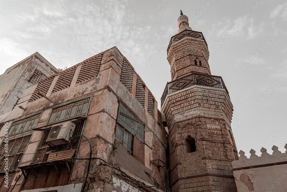 Al Shafei mosque seen from Suq Al Jami - Al Mazloum, Al Balad district, Historic Jeddah, Saudi Arabia - UNESCO world heritage site
