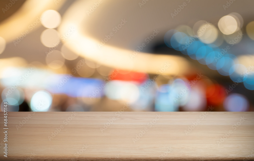 Naklejka premium Empty wood table top and blur of out door garden background Empty wooden table space for text marketing promotion. blank wood table copy space for background