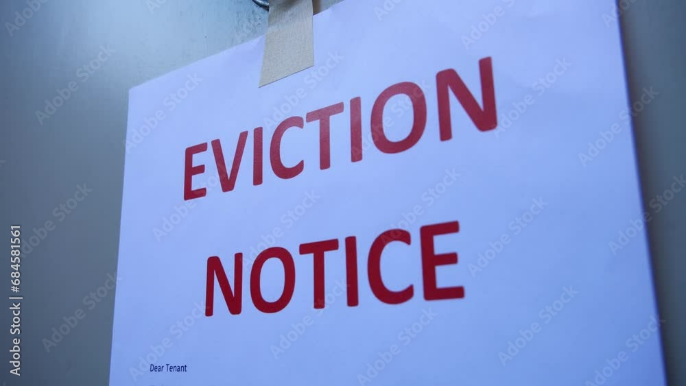 Close up Eviction Notice on Front Door Close up Eviction Notice on Front Door