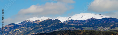 Banner travel with mountain view of alpine as snow-capped mount peaks in Winter mountains scene