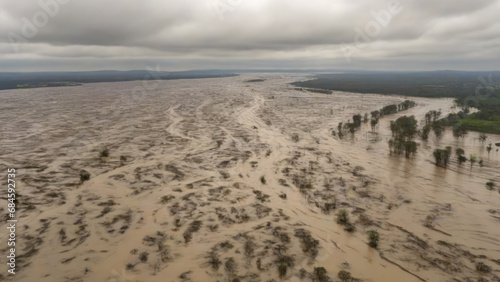 Muddy floodwaters, a consequence of heavy rainfall and inadequate flood management Generated with AI