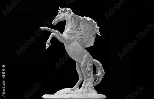 The horse statue is a leap To reach the finish line or victory.