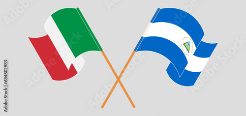 Crossed and waving flags of Italy and Nicaragua photo