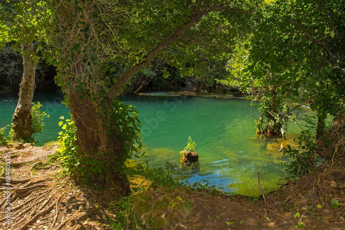 The River Una below Milancev Buk waterfall at Martin Brod in Una-Sana Canton, Federation of Bosnia and Herzegovina. Located in Una National Park, it is also known as Veliki Buk or Martinbrodski photo