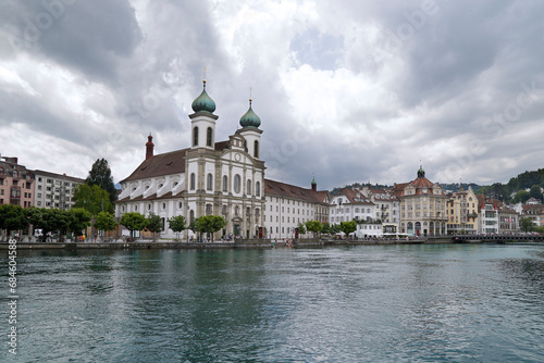 Jesuit church (Jesuitenkirche) over Reuss river, Lucerne, Switzerland.