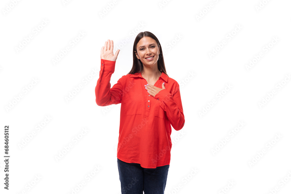 beautiful young business woman with black hair dressed in a loose red shirt gesturing on a white background with copy space beautiful young business woman with black hair dressed in a loose red shirt gesturing on a white background with copy space