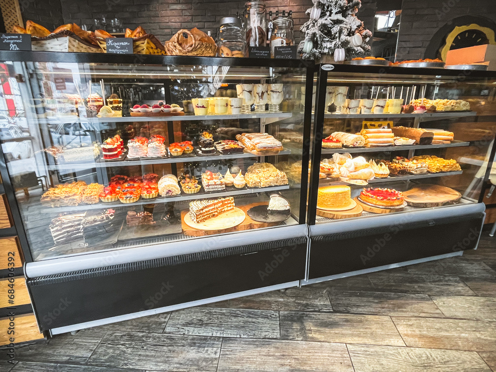 Assorted fancy cakes in a shop-window