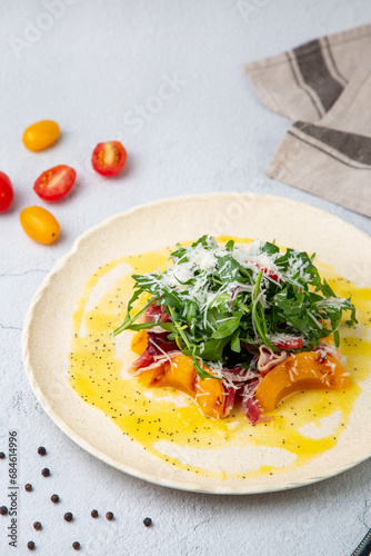 Wallpaper Mural green salad with arugula and lingonberries on a white plate and marble background side view Torontodigital.ca