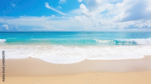 Beautiful landscape of sandy beach white sand and rolling calm wave on blue sky on Sunny day